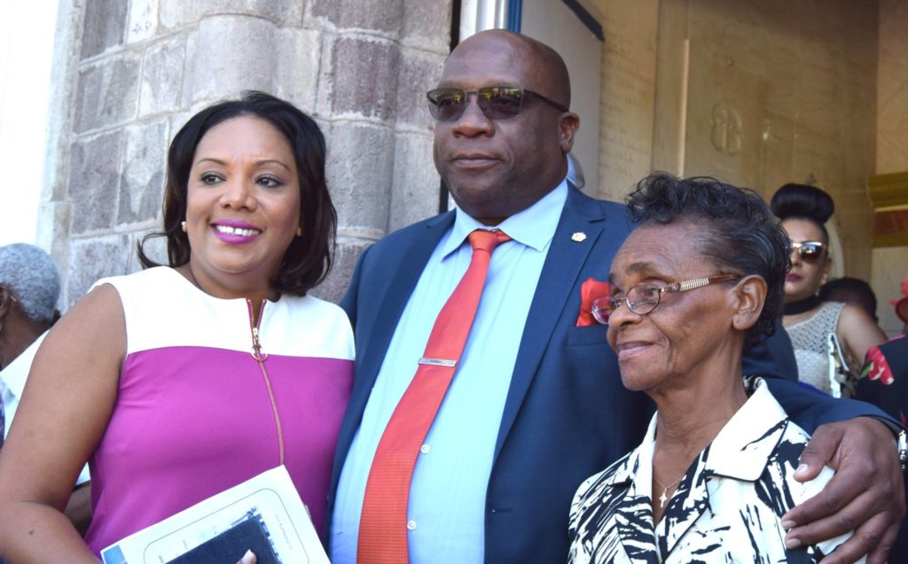 PM Harris greets faithful after Mass