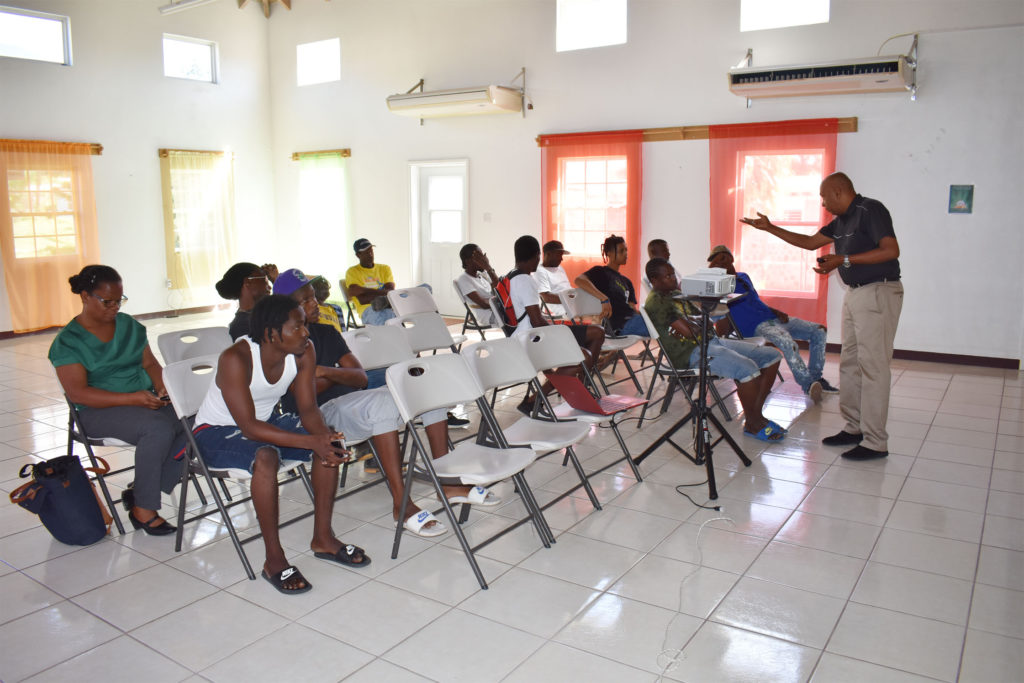 Dr Chitan empowering Nevis STEP environmental workers through social skill training