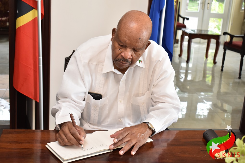 GOVERNOR GENERAL SIGNS BOOK OF CONDOLENCE FOR THE LATE RICHARD CAINES, CSM, JP