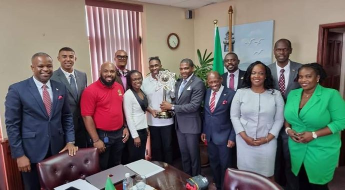 CABINET WELCOMES DWAYNE BRAVO AND THE 6IXTY CHAMPIONSHIP TROPHY