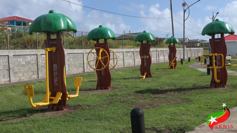 EXERCISE EQUIPMENT AT THE NEW ROAD FAMILY PARK MEANT TO ENCOURAGE PERSONAL PHYSICAL FITNESS